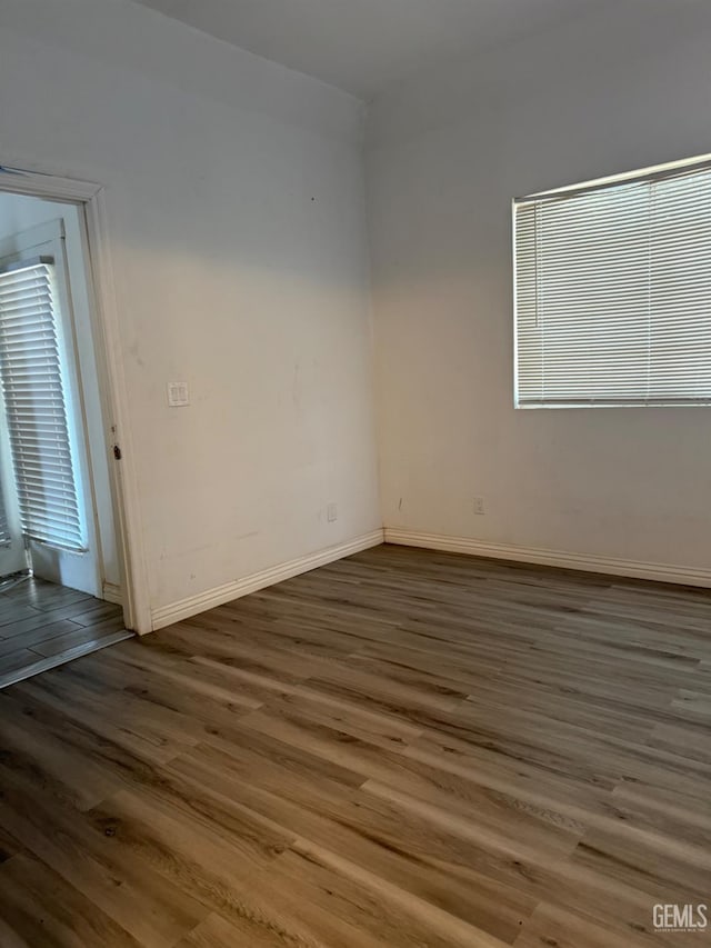 1107 Monterey St, Bakersfield, CA 93305 - empty room with wood finished floors