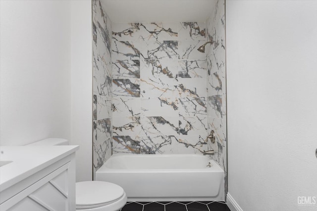 full bathroom with toilet, vanity,  shower combination, and tile patterned floors