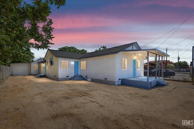 back of house featuring fence, crawl space, stucco siding, and a shingled roof