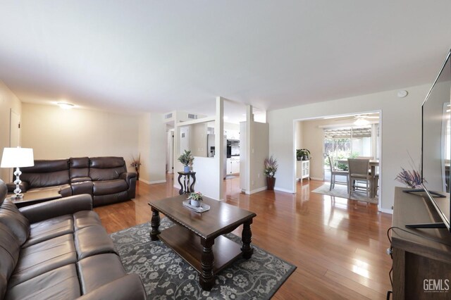 408 Pebble Beach Dr, Bakersfield, CA 93309 - living area featuring wood finished floors and baseboards