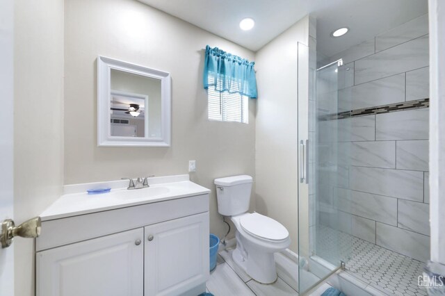 408 Pebble Beach Dr, Bakersfield, CA 93309 - bathroom with toilet, a stall shower, vanity, and recessed lighting