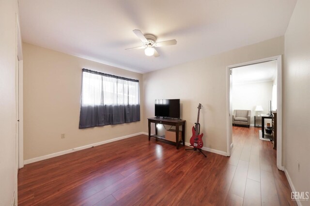 408 Pebble Beach Dr, Bakersfield, CA 93309 - living area featuring baseboards, a ceiling fan, and wood finished floors