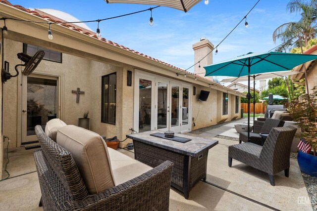 8220 Birmingham St, Bakersfield, CA 93311 - view of patio / terrace with french doors and an outdoor hangout area