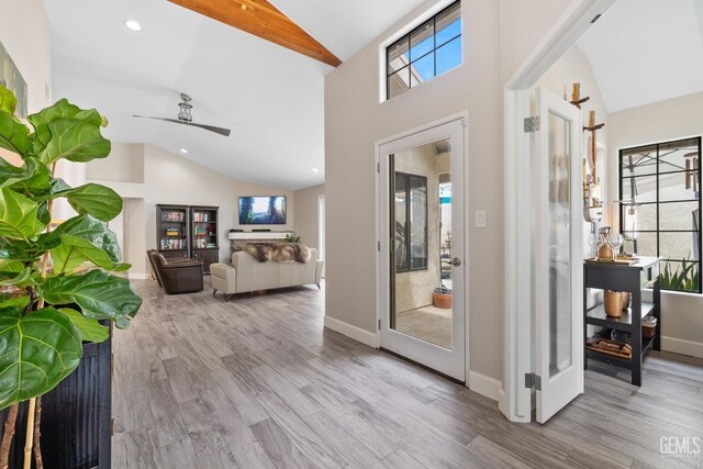 8220 Birmingham St, Bakersfield, CA 93311 - entryway featuring plenty of natural light, wood finished floors, a ceiling fan, recessed lighting, and high vaulted ceiling