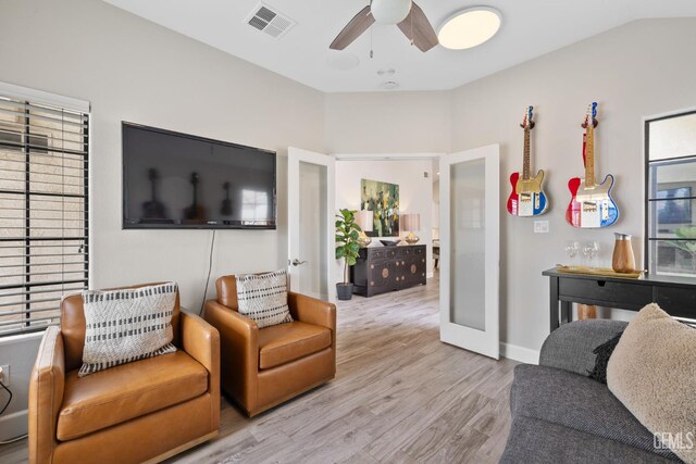 8220 Birmingham St, Bakersfield, CA 93311 - living room with wood finished floors, a ceiling fan, french doors, and baseboards