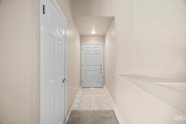 10200 Cheyenne Dr, Bakersfield, CA 93312 - corridor featuring light tile patterned floors and light carpet