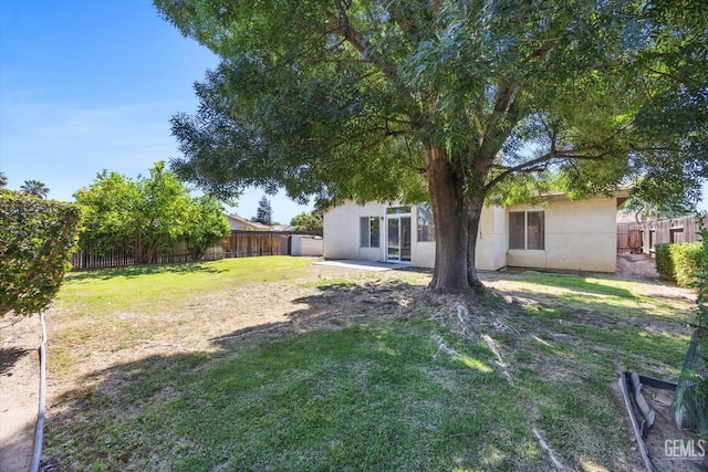 10200 Cheyenne Dr, Bakersfield, CA 93312 - fenced backyard with a patio