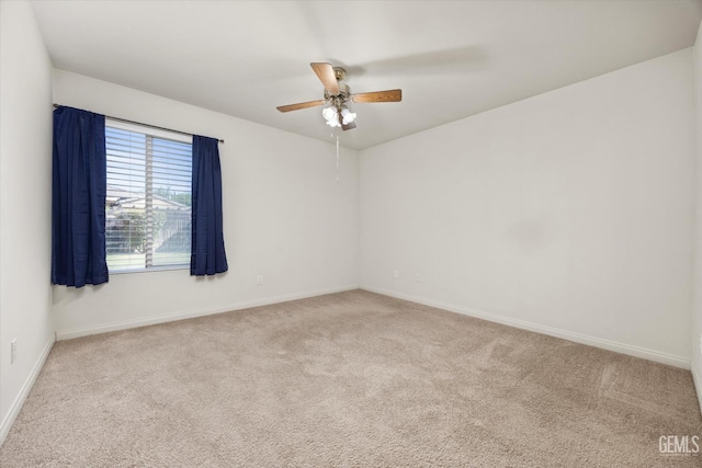 10200 Cheyenne Dr, Bakersfield, CA 93312 - carpeted empty room with baseboards and a ceiling fan