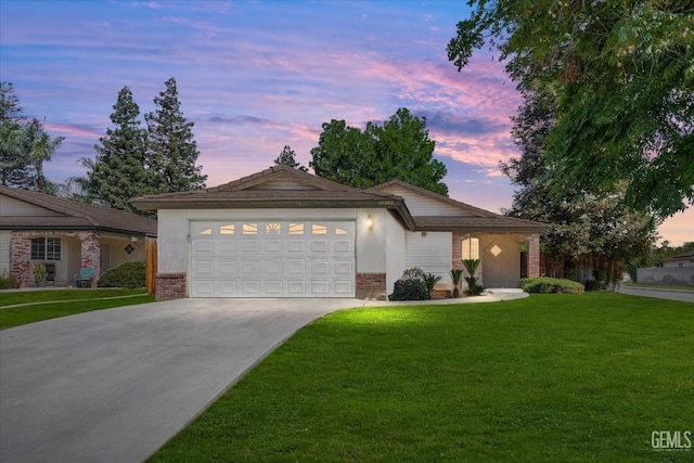 10200 Cheyenne Dr, Bakersfield, CA 93312 - single story home featuring brick siding, concrete driveway, an attached garage, and a front yard