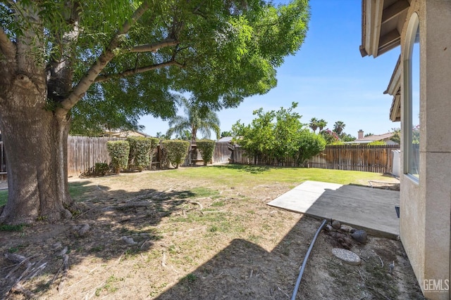 10200 Cheyenne Dr, Bakersfield, CA 93312 - fenced backyard with a patio area