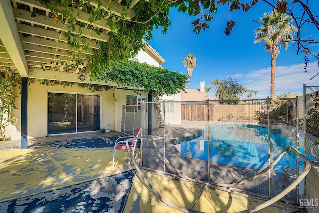 view of pool featuring a patio area