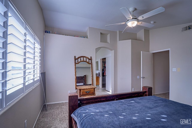 bedroom with ceiling fan and carpet floors