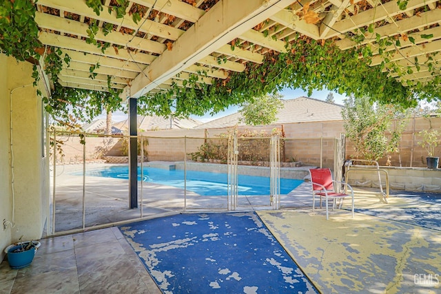 view of patio with a fenced in pool