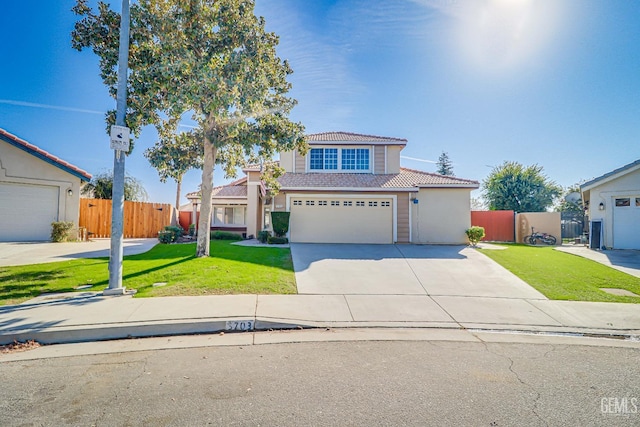 view of front facade featuring a garage and a front lawn