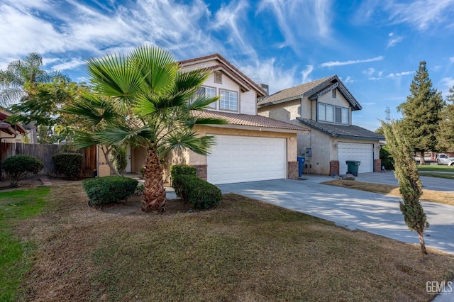 view of front facade with a garage and a front yard