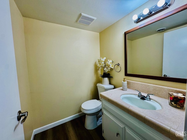 4208 Tierra Verde St Unit 2, Bakersfield, CA 93301 - bathroom featuring vanity and wood finished floors