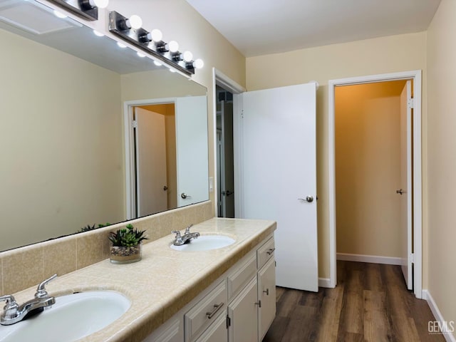 4208 Tierra Verde St Unit 2, Bakersfield, CA 93301 - full bathroom featuring double vanity and wood finished floors