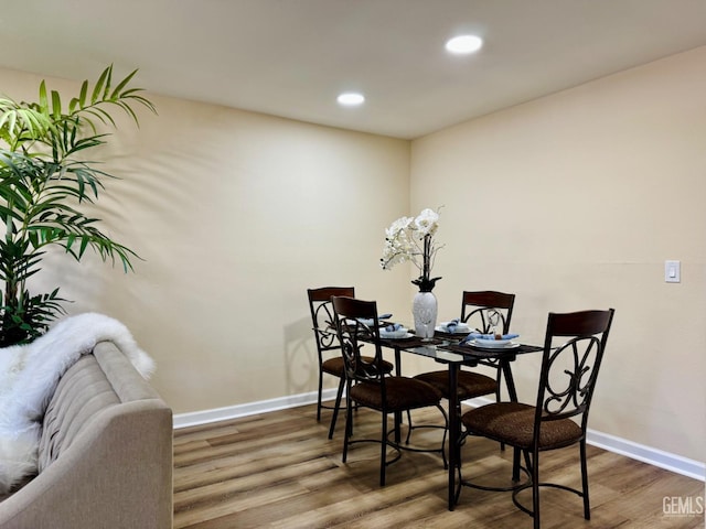 4208 Tierra Verde St Unit 2, Bakersfield, CA 93301 - dining room featuring wood finished floors and recessed lighting