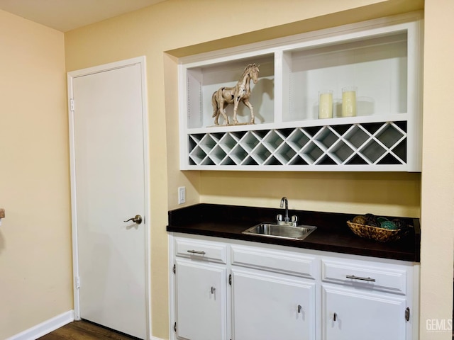 4208 Tierra Verde St Unit 2, Bakersfield, CA 93301 - indoor wet bar featuring dark wood-style floors