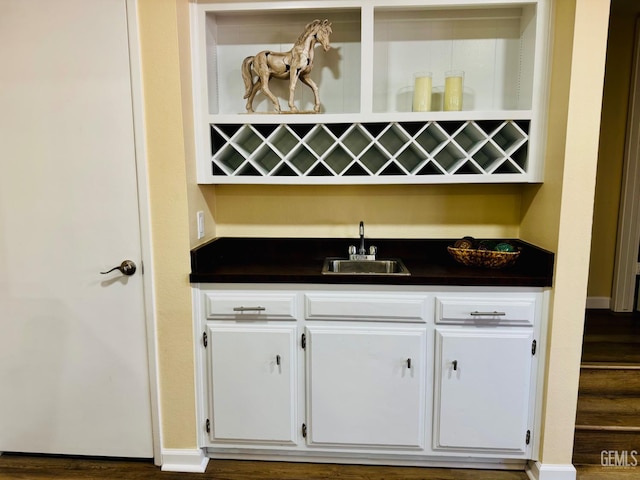 4208 Tierra Verde St Unit 2, Bakersfield, CA 93301 - indoor wet bar with dark wood-style floors