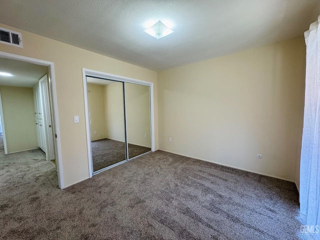 4208 Tierra Verde St Unit 2, Bakersfield, CA 93301 - unfurnished bedroom featuring carpet floors and a closet