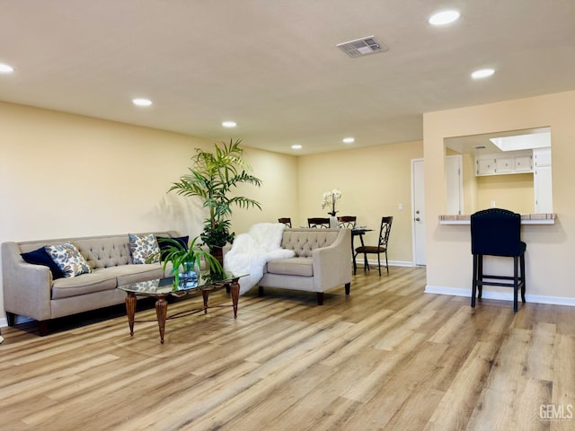 4208 Tierra Verde St Unit 2, Bakersfield, CA 93301 - living room with recessed lighting and light wood-type flooring