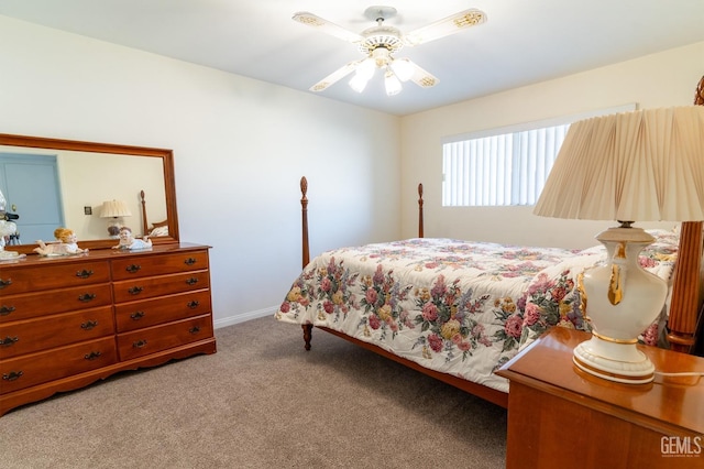 bedroom with ceiling fan and carpet