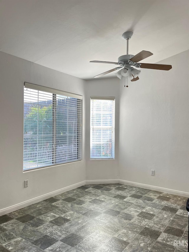 empty room featuring ceiling fan