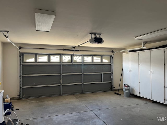 garage featuring a garage door opener