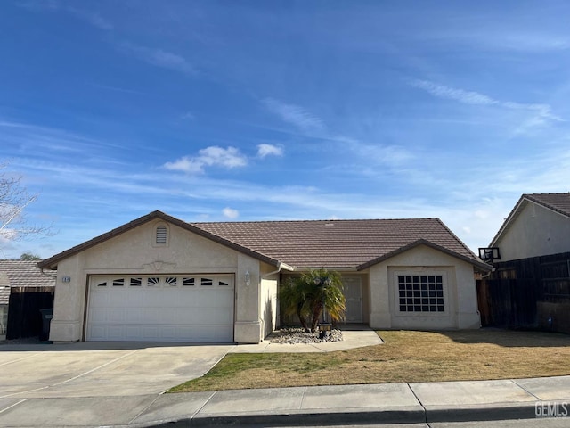 ranch-style house featuring a garage