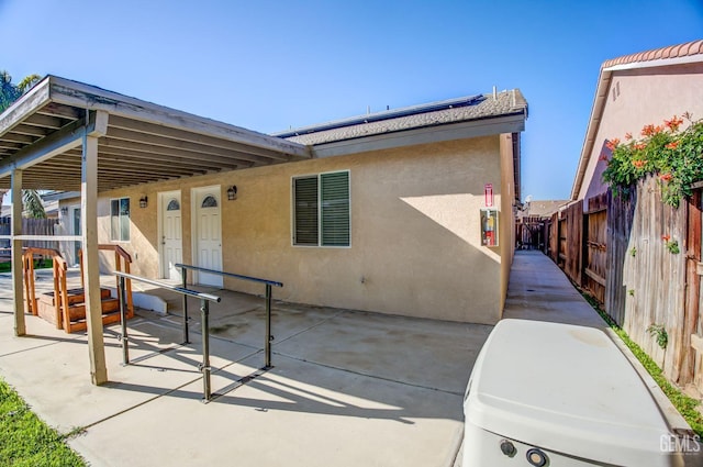 rear view of house with a patio