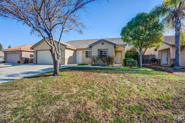 ranch-style home featuring a garage and a front lawn