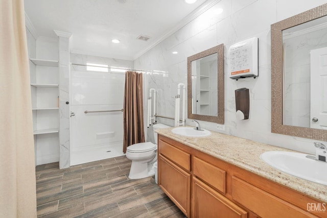 bathroom with toilet, a shower with curtain, tile walls, ornamental molding, and vanity