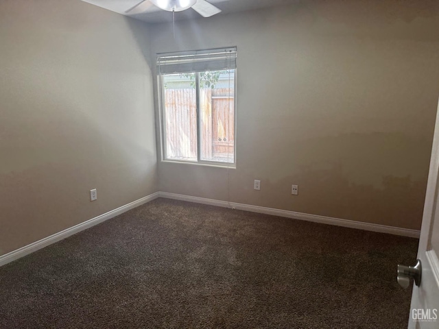 empty room with carpet flooring and ceiling fan