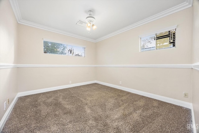 unfurnished room featuring carpet flooring, ceiling fan, and crown molding