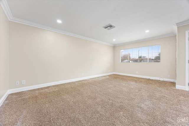 spare room with carpet flooring and ornamental molding