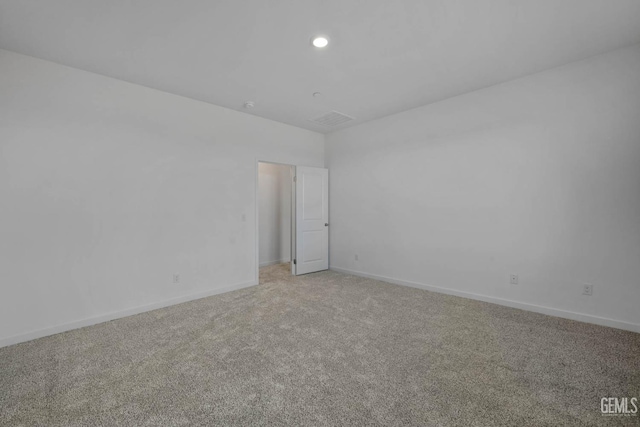 8407 Seth Alexander Way, Bakersfield, CA 93306 - empty room featuring light colored carpet, baseboards, and recessed lighting
