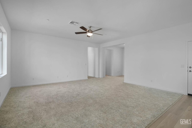 8407 Seth Alexander Way, Bakersfield, CA 93306 - unfurnished room featuring ceiling fan, baseboards, and light wood finished floors