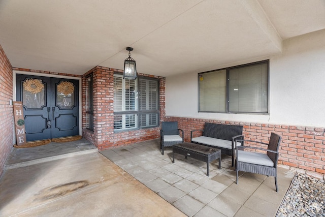 view of patio featuring french doors