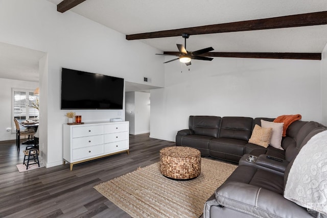 living area featuring dark wood finished floors, vaulted ceiling with beams, and baseboards