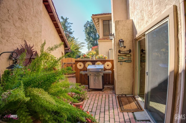 view of patio / terrace featuring a grill