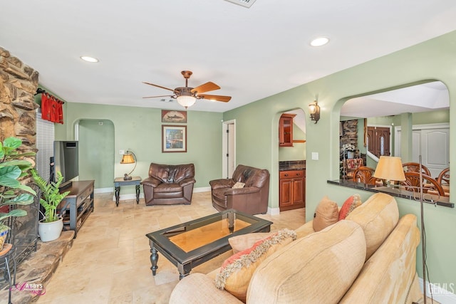 living room with ceiling fan