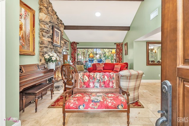 living room with lofted ceiling with beams