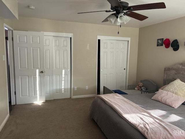 5308 Eastridge Ct, Bakersfield, CA 93306 - carpeted bedroom with two closets, baseboards, and ceiling fan