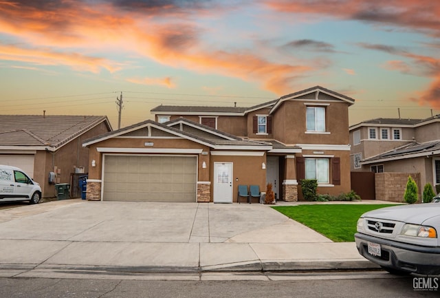 view of front of home with a garage