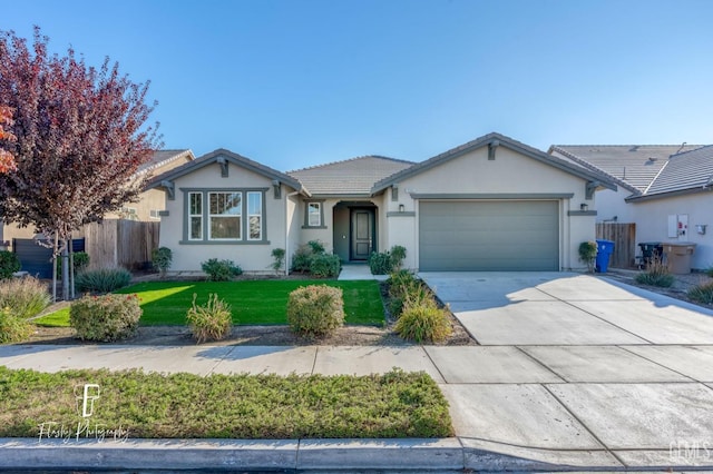 single story home featuring a front yard and a garage