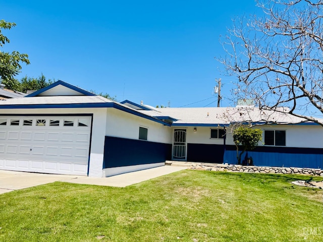 2301 Tangerine St, Bakersfield, CA 93306 - ranch-style home with a garage, a front lawn, stucco siding, and driveway