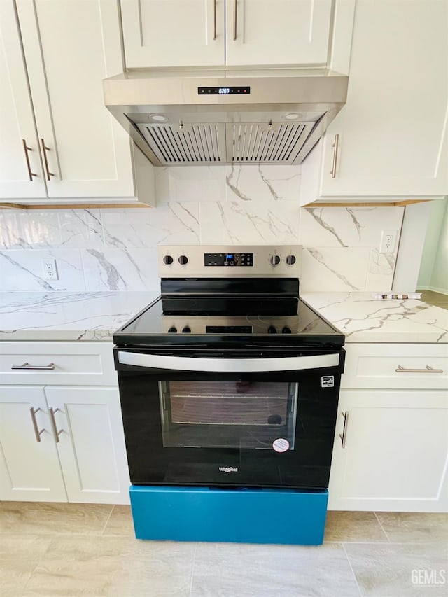 2301 Tangerine St, Bakersfield, CA 93306 - kitchen featuring extractor fan, electric range, white cabinetry, and light stone counters