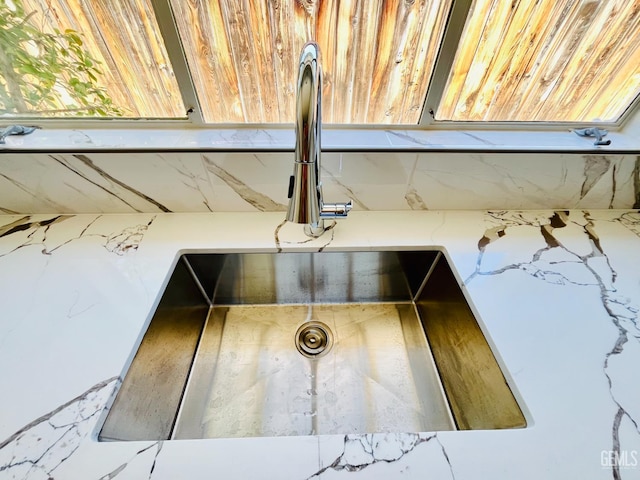 2301 Tangerine St, Bakersfield, CA 93306 - kitchen view of a sink and light stone counters