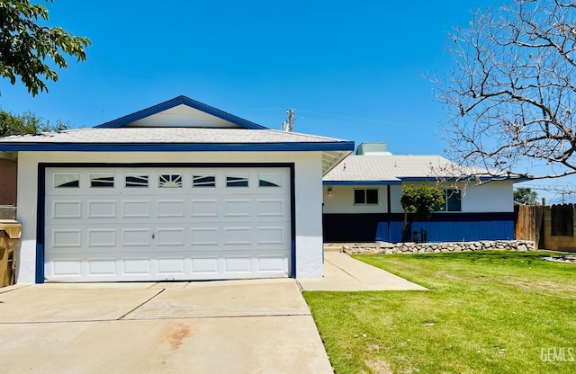 2301 Tangerine St, Bakersfield, CA 93306 - ranch-style home with stucco siding, concrete driveway, and a garage